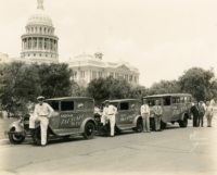 Trucks belonging to the Lightsey Carroll Company Distributors in front of the Texas State Capitol, shortly after the end of nationwide Prohibition. Photo No. C06561, Austin History Center, Austin Public Library