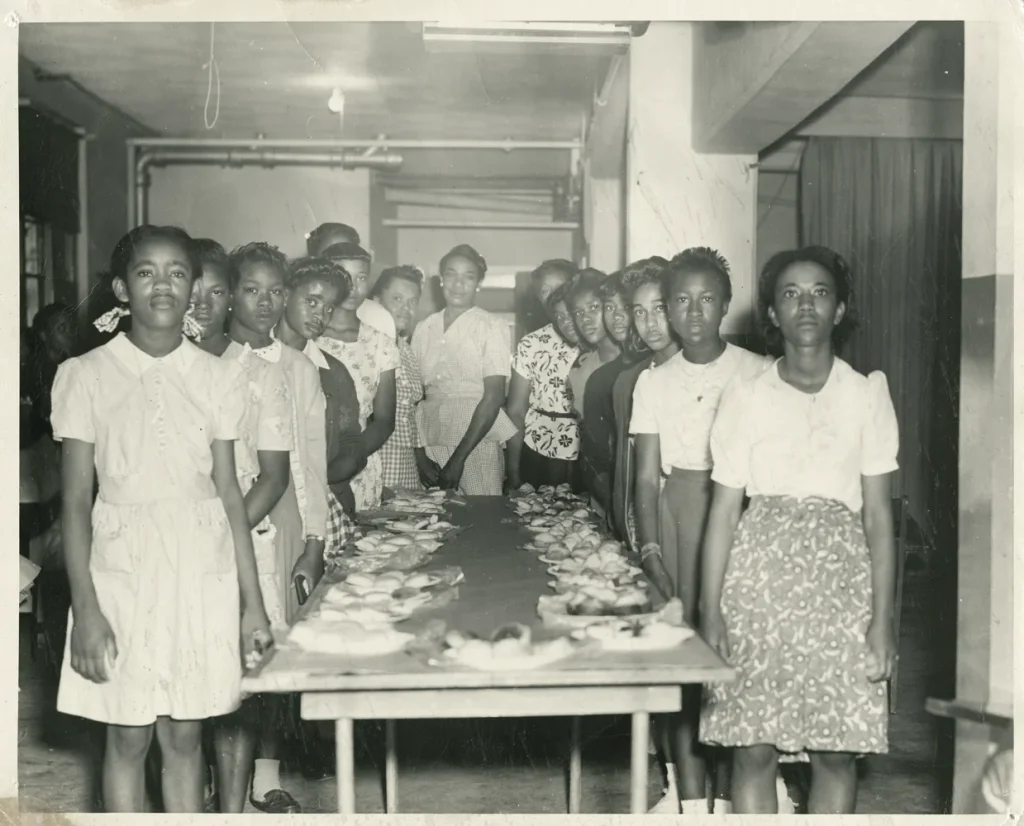 Girls in a domestic education class, undated. -Photo No. AR 2000.025 (162), Austin History Center, Austin Public Library