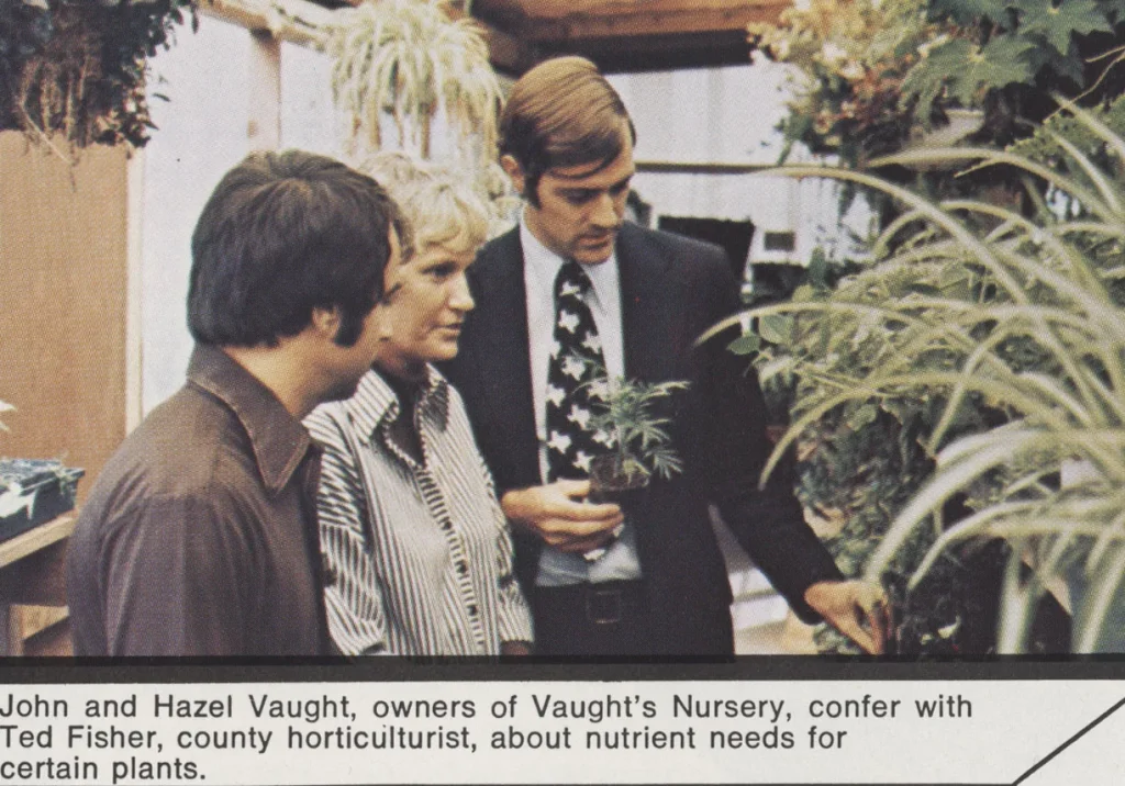 John and Hazel Vaught, owners of Vaught’s Nursery, confer with Ted Fisher, county Horticulturist, about nutrient needs for certain plants. -Texas Agricultural Extension Service Annual Report, 1974